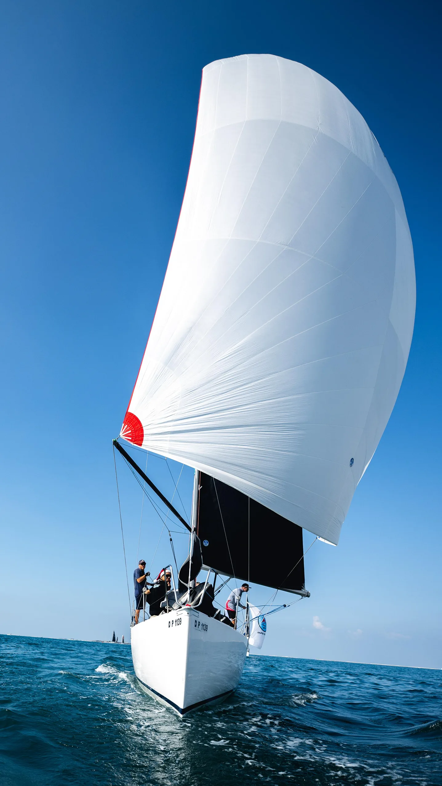 The Victoria Too crew racing on deck
